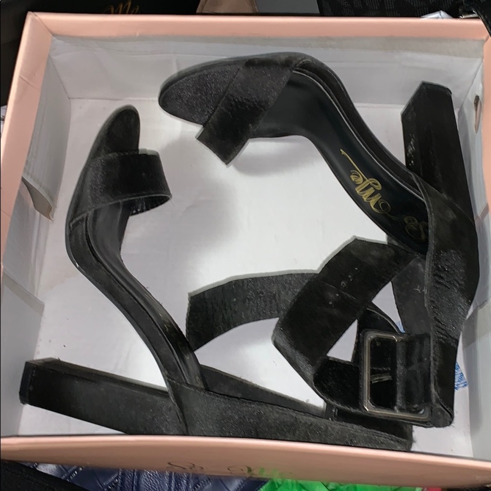 Black Suede heels.